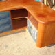 Corner base cabinet in solid Pao Rosa wood with 8 drawers and blue Alcantara lining