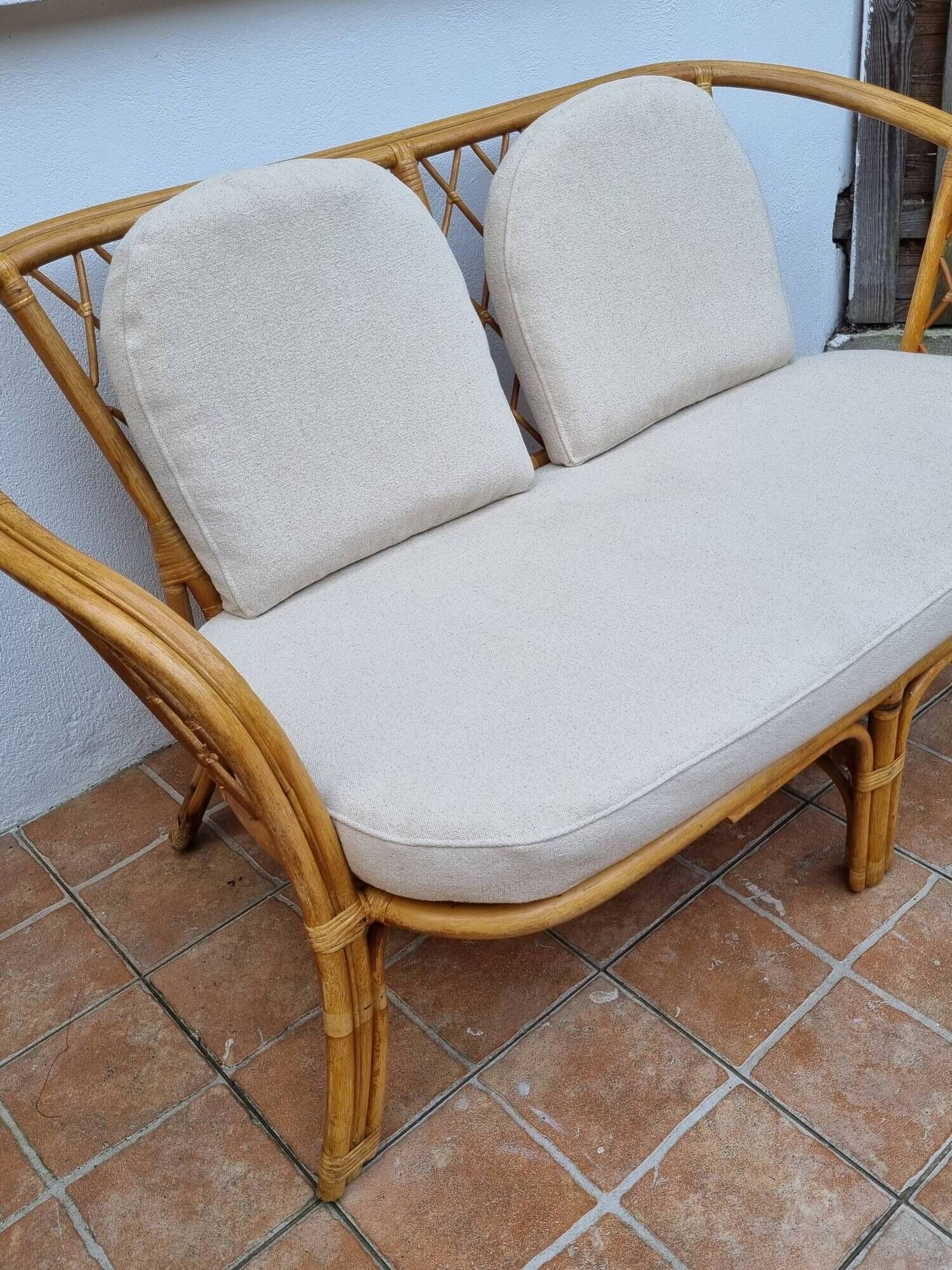 Vintage two-seater natural rattan sofa with cotton cushions, 140 cm