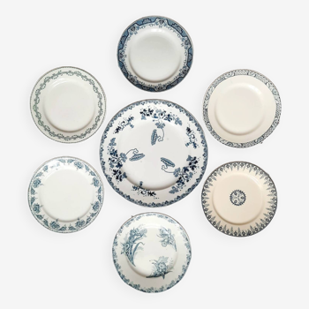 Old mismatched iron earthenware dessert plates accompanied by a dish