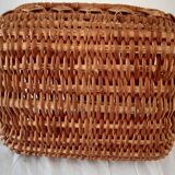 Old wicker basket with diamond-shaped decorations