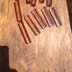 Ten pink glass knife holders