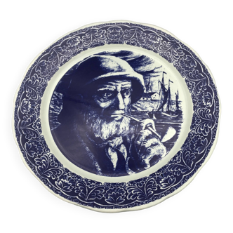 Blue enamelled earthenware wall plate with fisherman decor, Boch La Louvière, Belgium