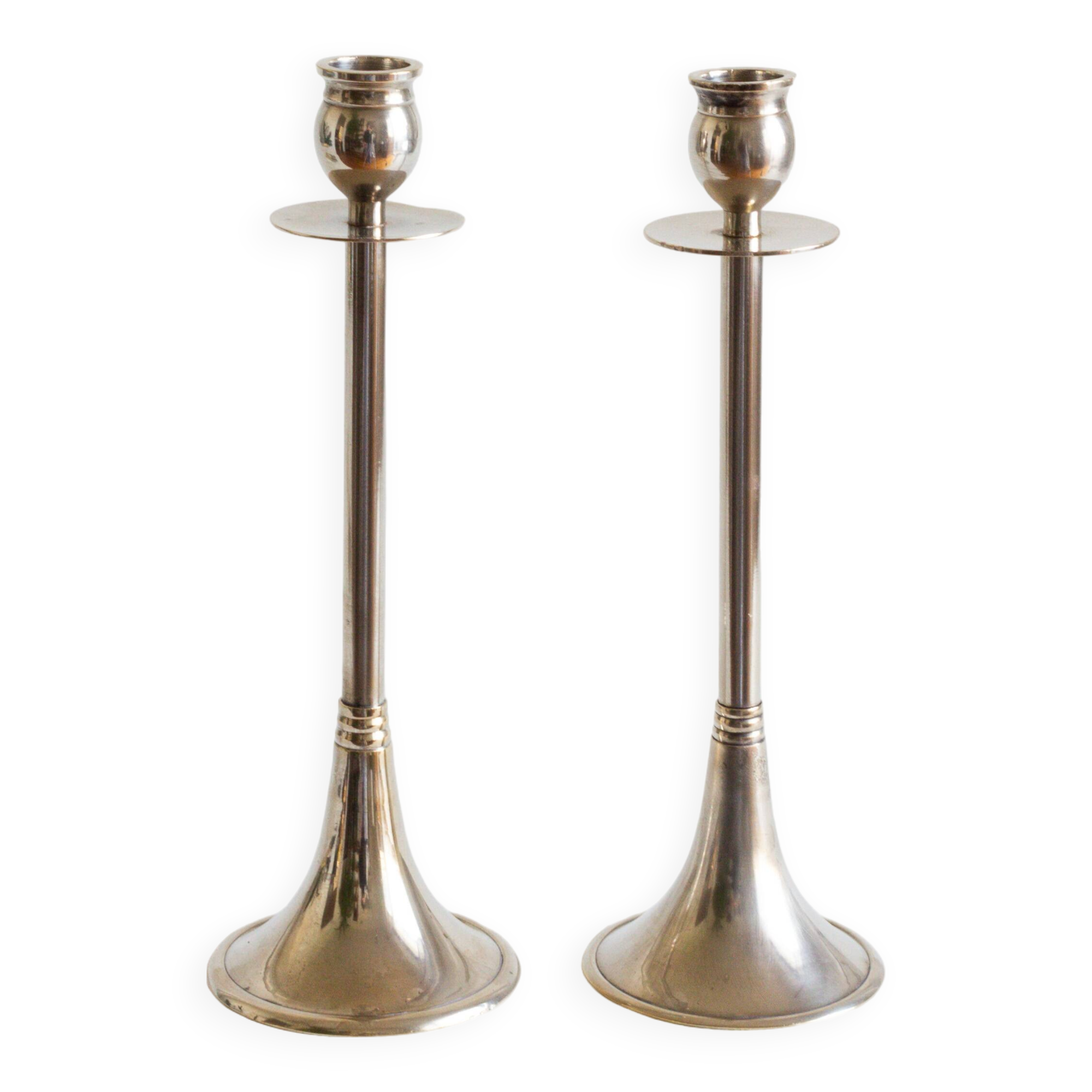 Duo of silver-plated brass candlesticks, 1950s/1960s