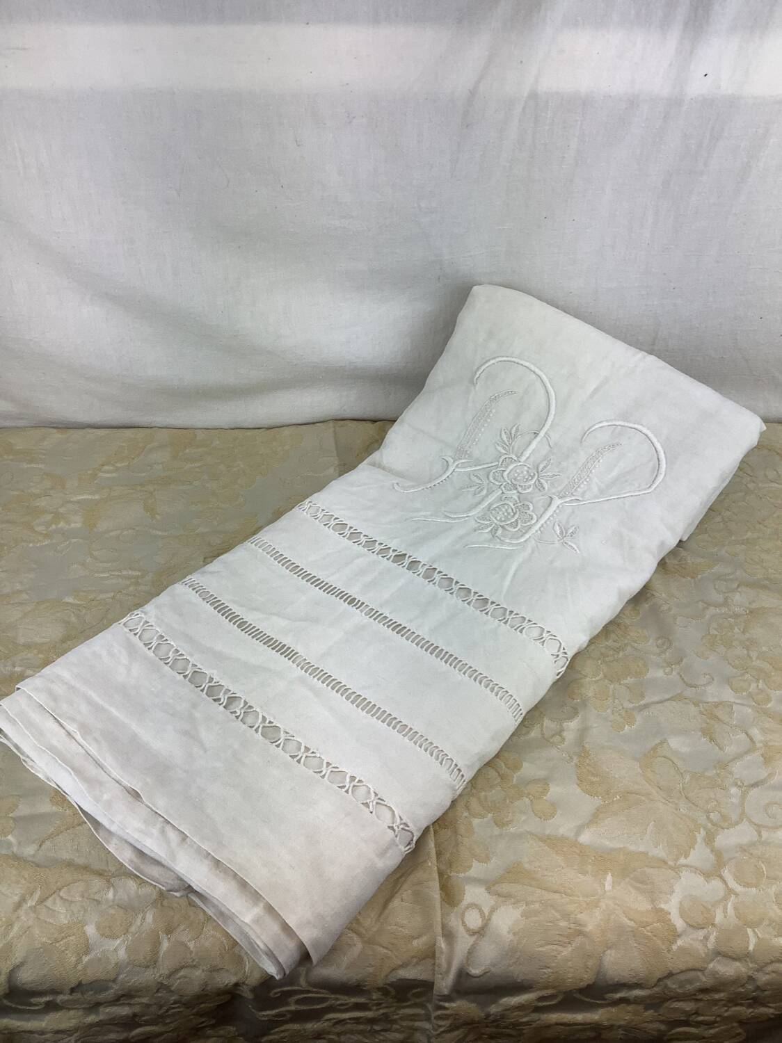 Old linen sheet with monogram embroidery