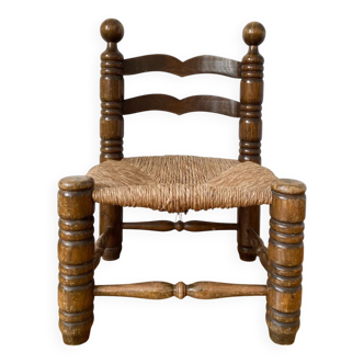 Chaise basse paillée style Charles Dudouyt