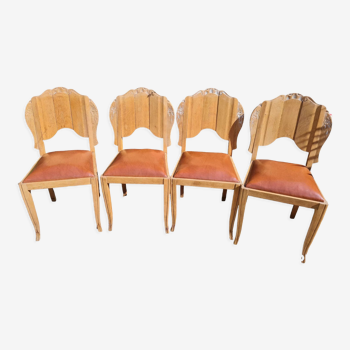 Set of wooden and skai chairs