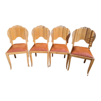 Set of wooden and skai chairs