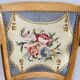 19th century St Empire armchair in pegged blond walnut with cross-stitched tapestries