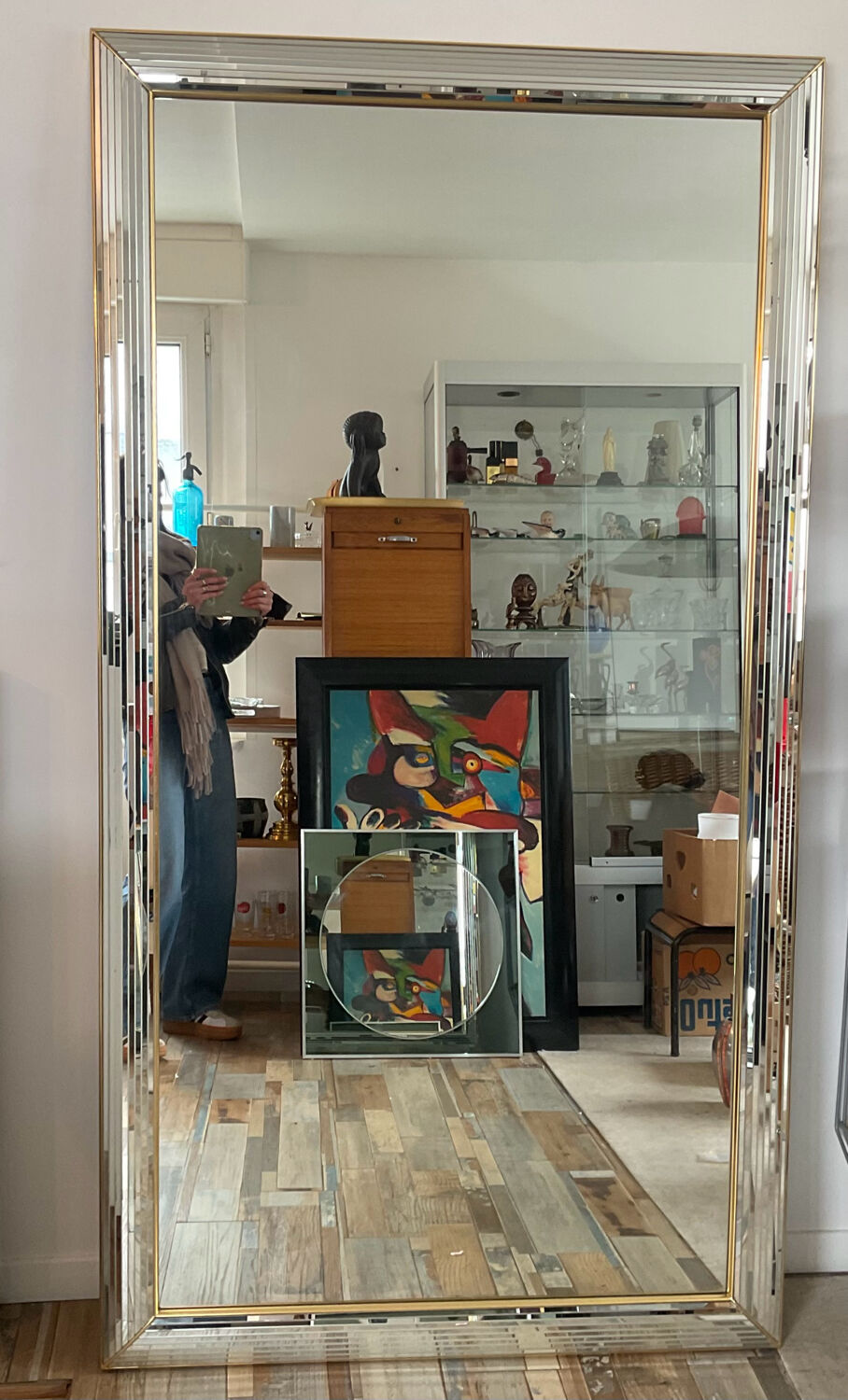 Large vintage Hollywood Regency style mirror with shutters.