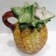 Pitcher on pineapple earthenware