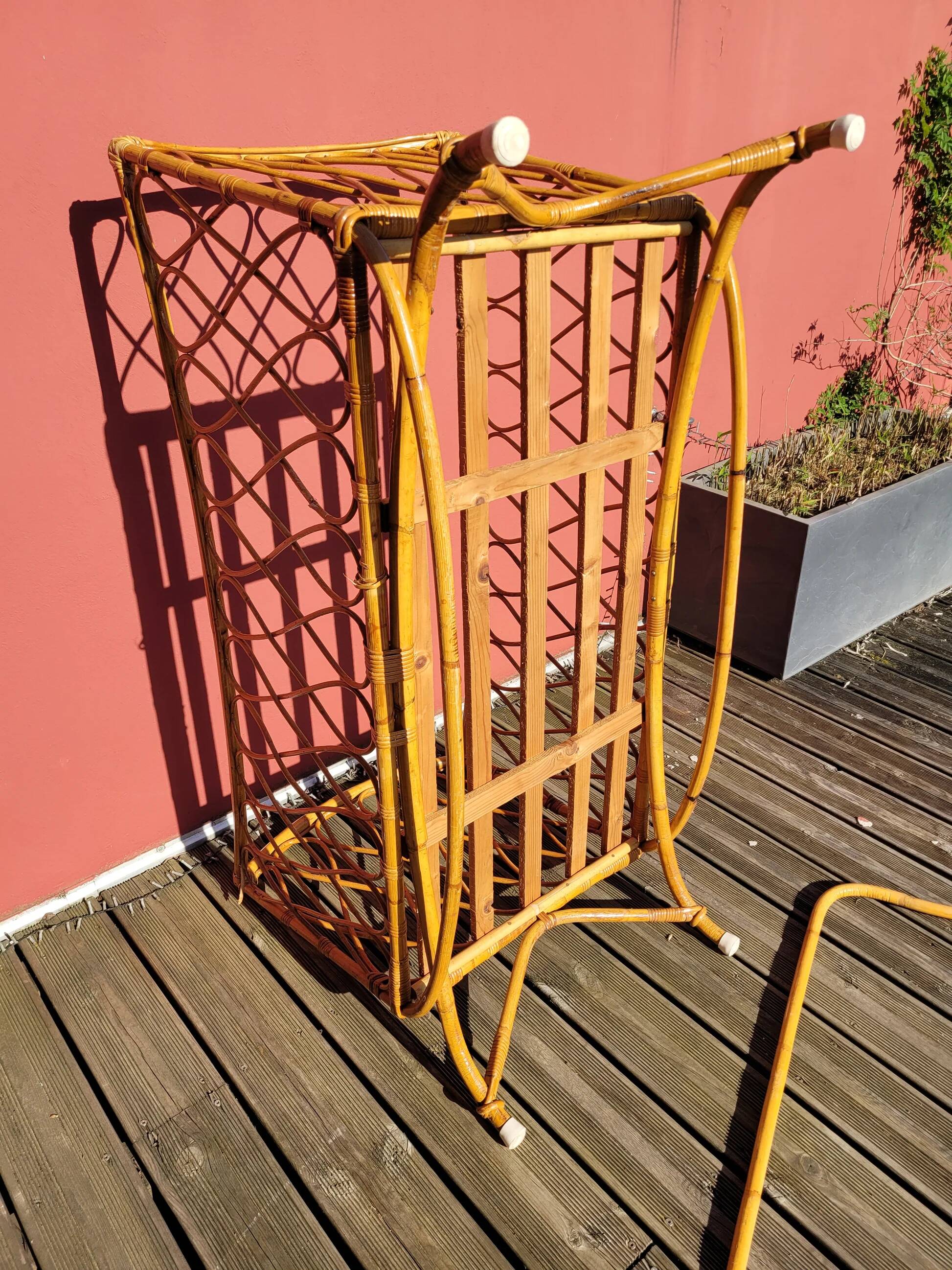 Bamboo and rattan baby cot with canopy.