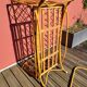 Bamboo and rattan baby cot with canopy.