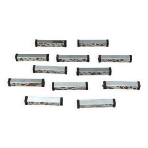 Série de 12 porte couteaux - modernistes