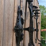 Pair of black wrought iron sconces - neo-Gothic style - from the 1950s