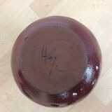 Red ceramic vase with handle