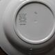 A set of 4 mismatched Art Deco red blue soup plates