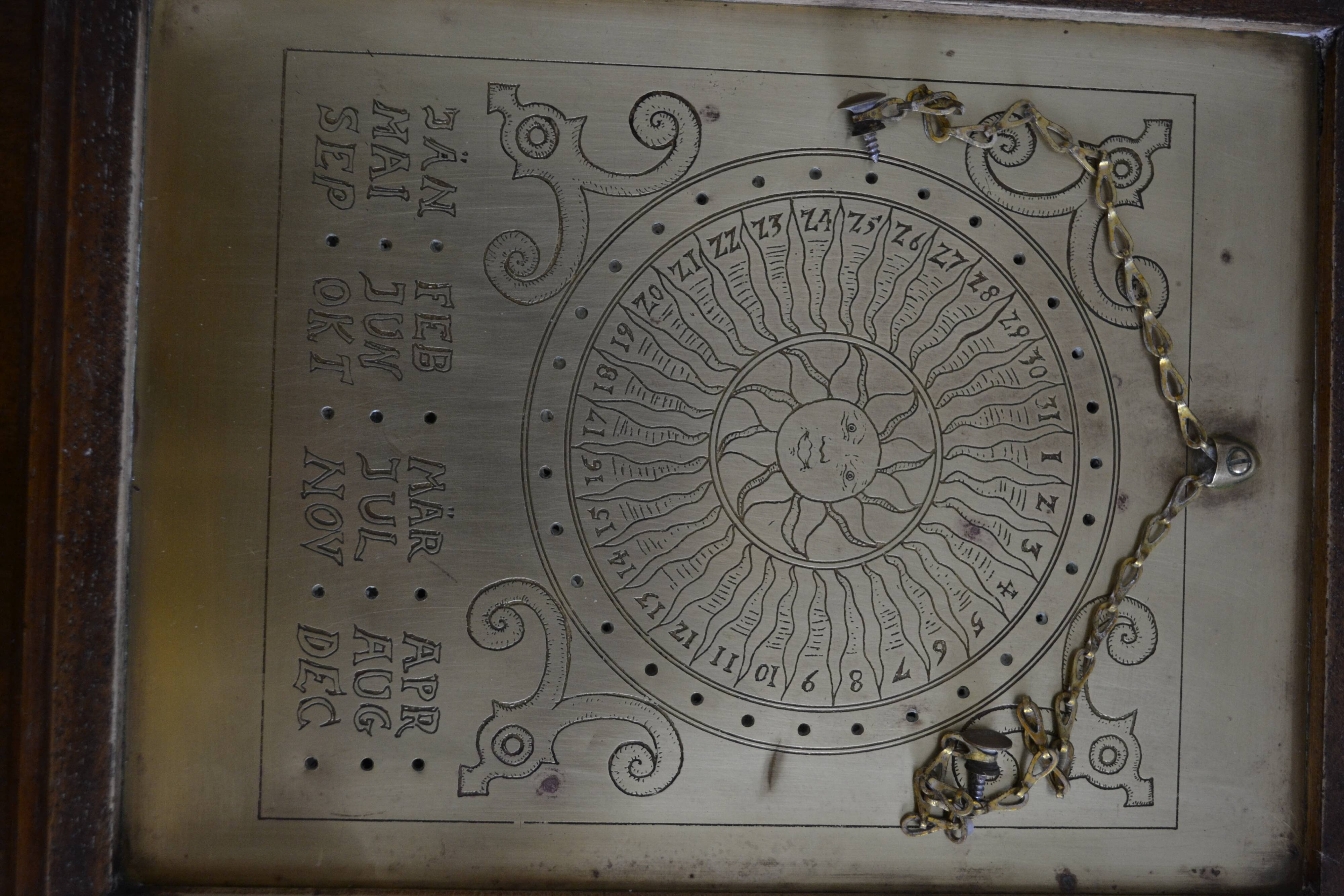 Drink with wooden keys solar perpetual calendar