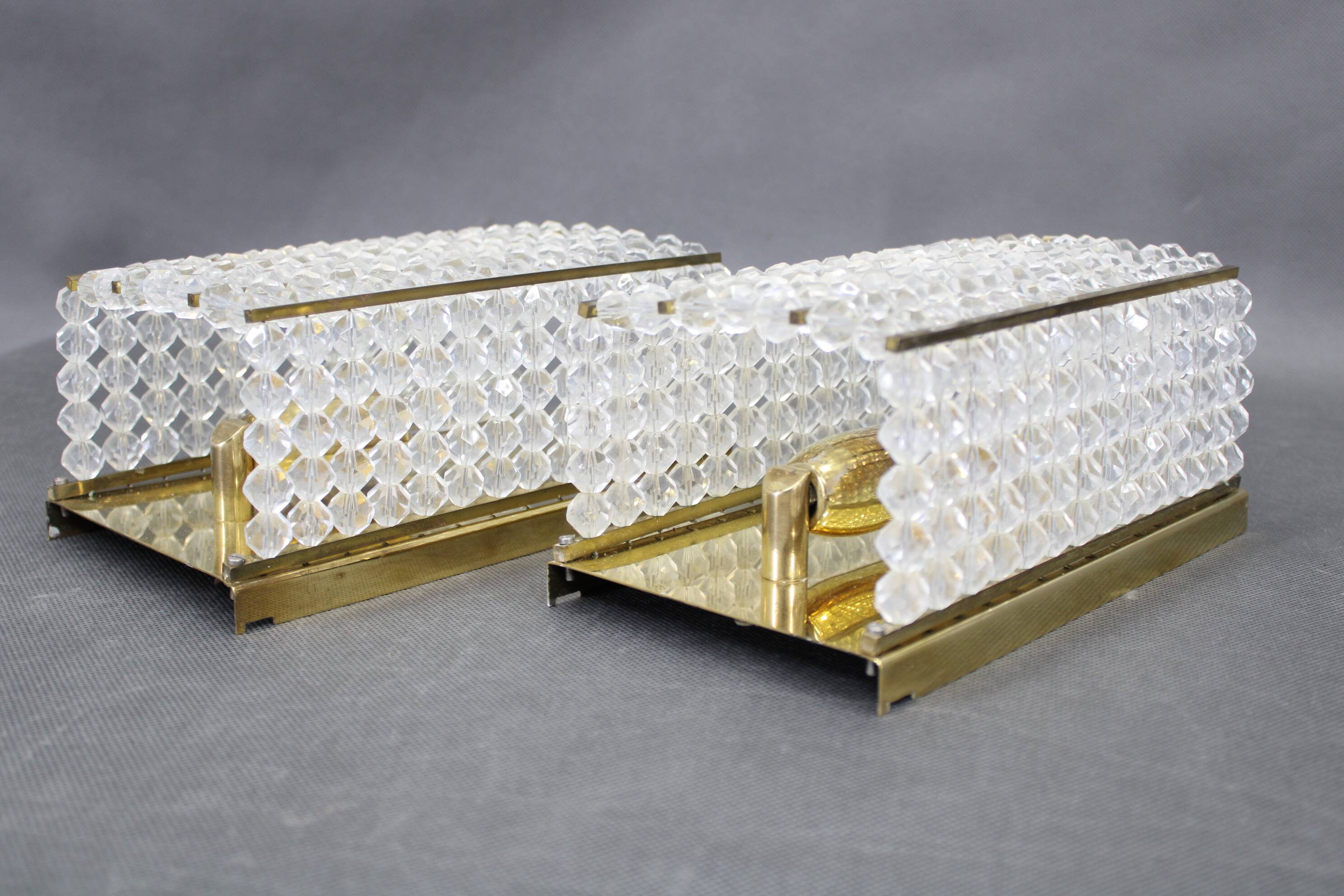 Pair of Austrian mid-century brass and acrylic wall lights, 1970s