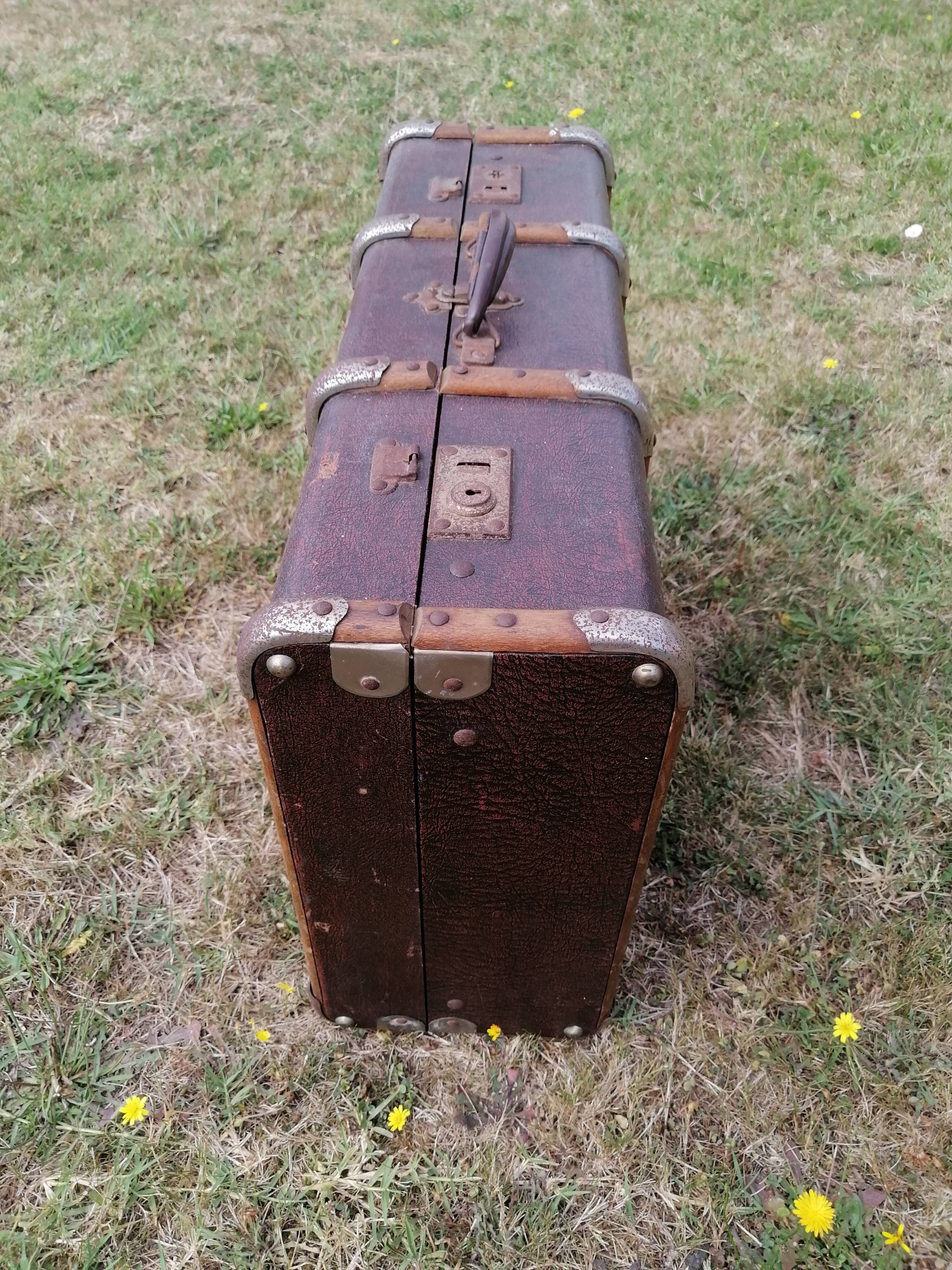 Antique suitcase in leather wood and vintage metal