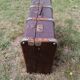 Antique suitcase in leather wood and vintage metal