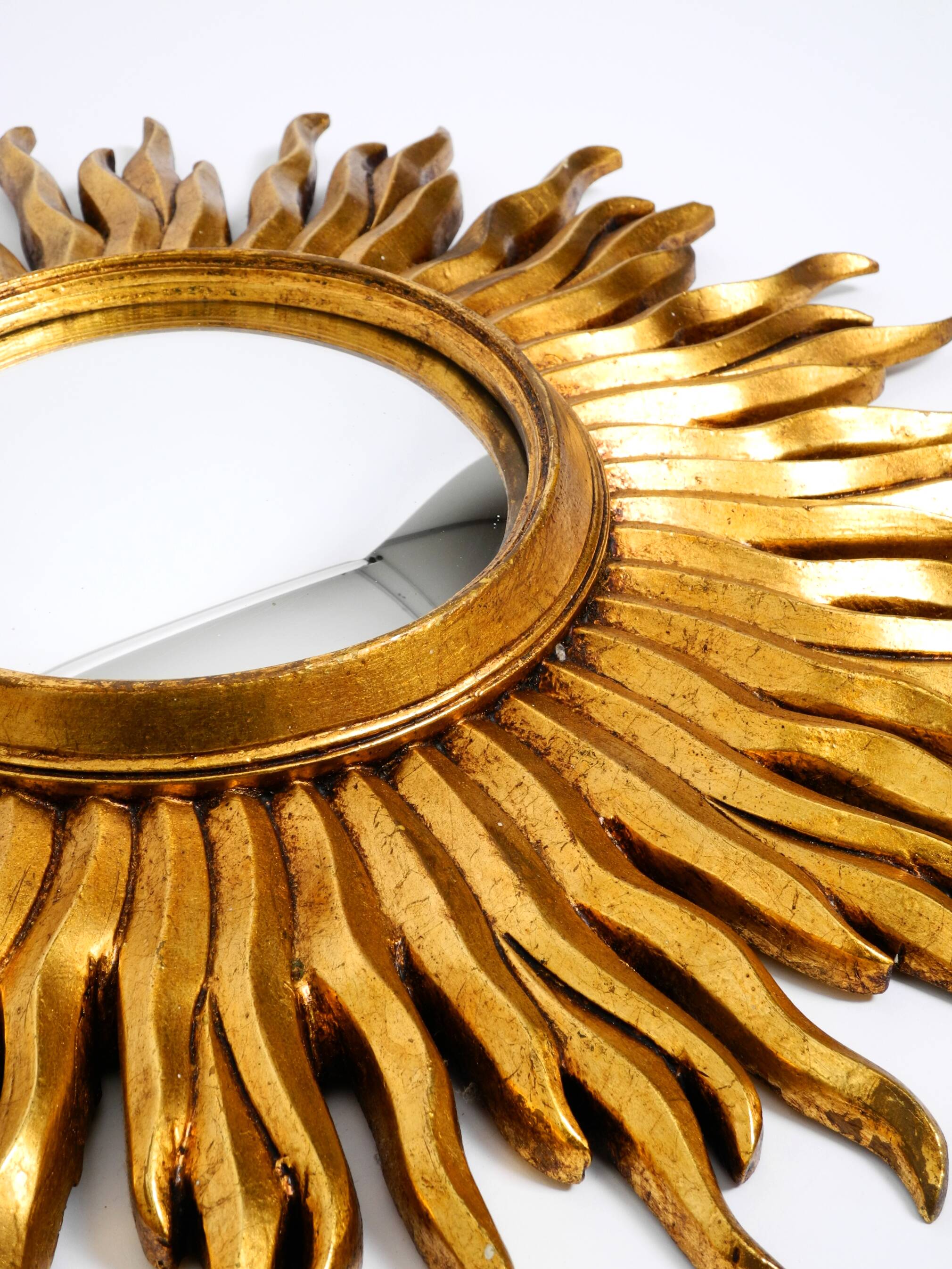 Mid Century Sunburst Kovex wall mirror made of wood and resin - gold plated