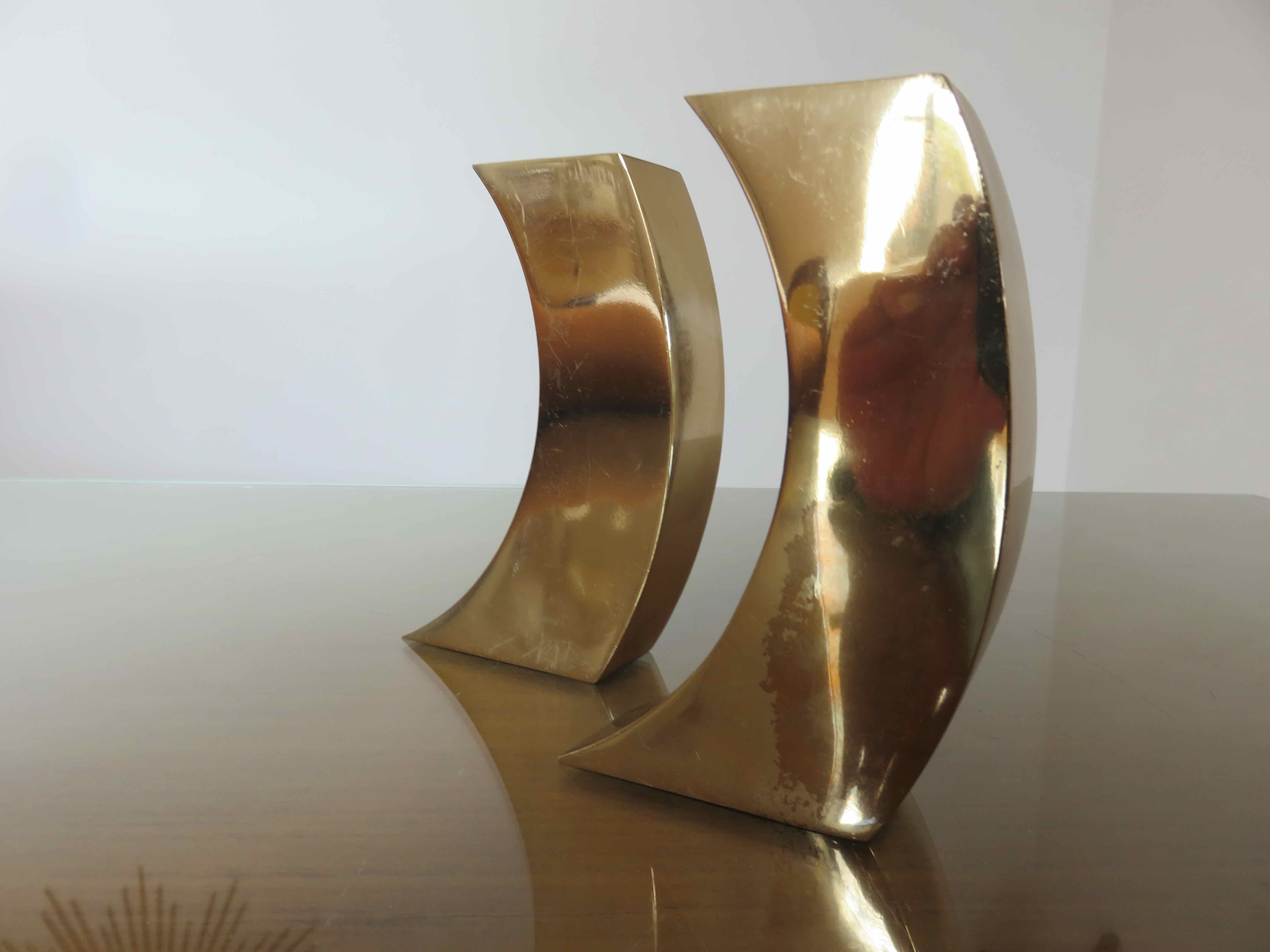 Pair of candle holders in golden brass, 70s