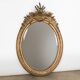19th C antique French oval gold leaf mirror with crest