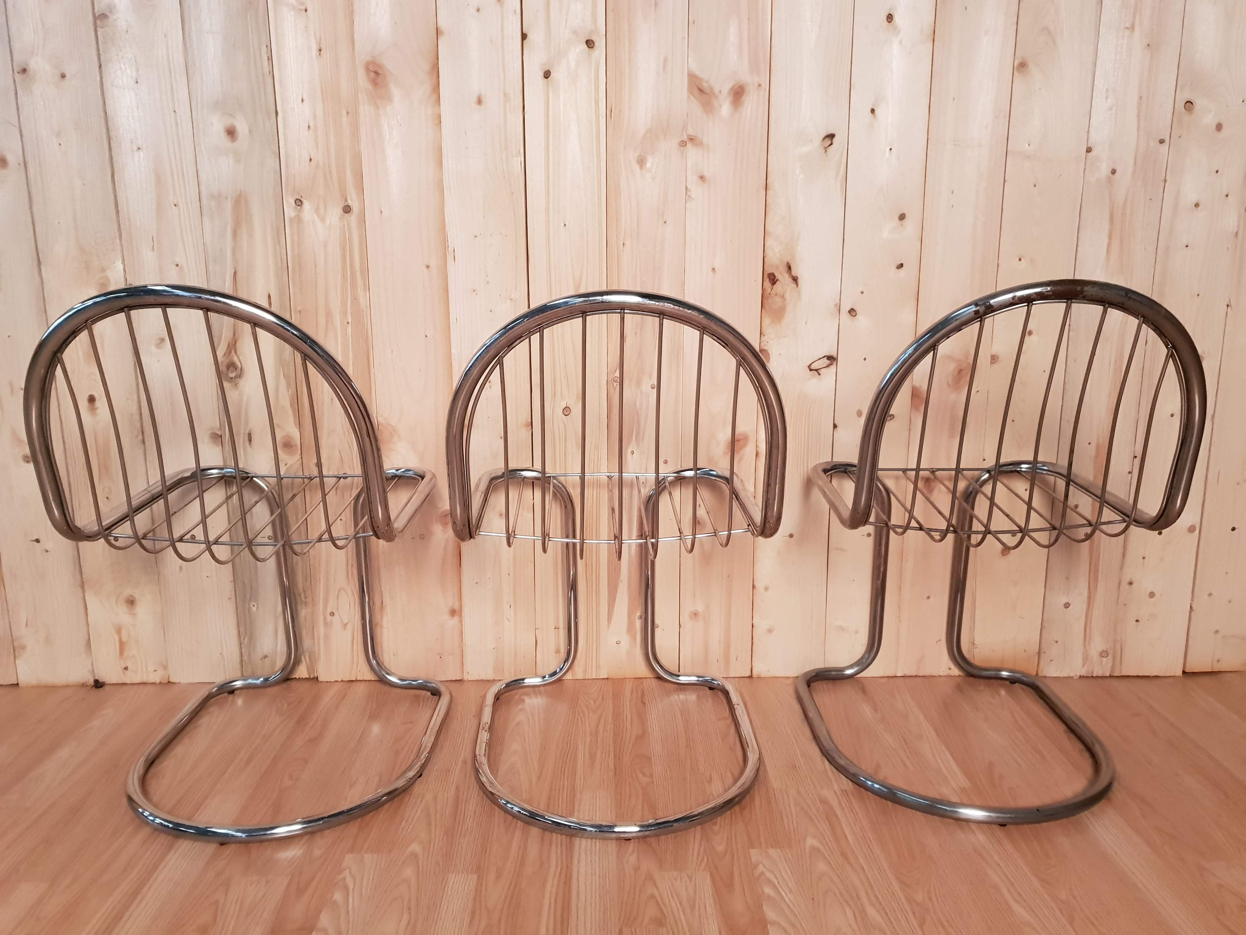 Set of 6 vintage stainless steel rounded chairs