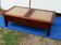 Table basse en noyer et rotin