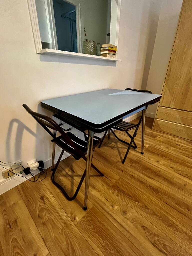 Extendable blue formica table