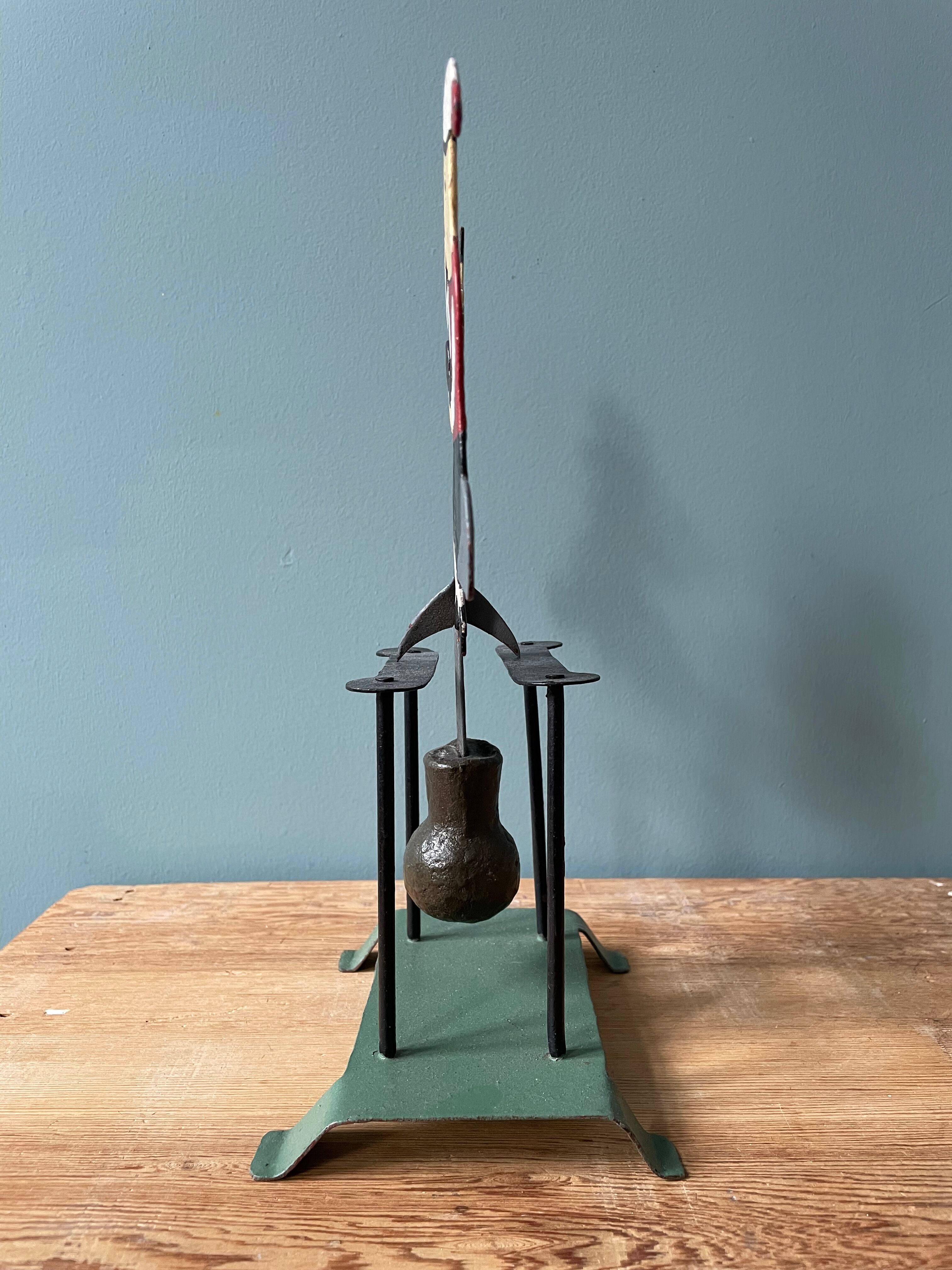 Old mobile toy with pendulum