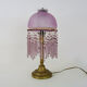 Table lamp, bedside lamp, speckled pink globe and glass and wood beads. Year 60