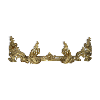 Adornment, bronze fireplace trim and these bronze chenets, late nineteenth Rocaille style