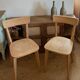 Pair of vintage bistro chairs made of raw solid wood.
