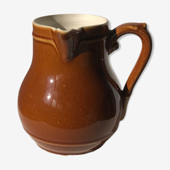 Pitcher in light brown sandstone glazed side handle