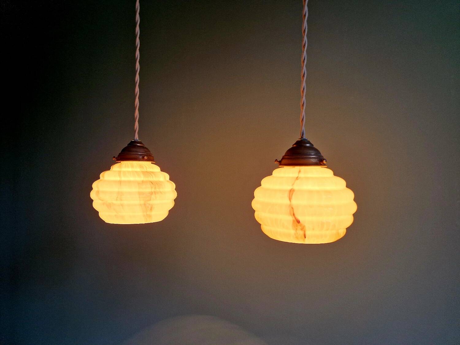 Pair of Art Deco marbled opaline pendant lights, 1920s-30s
