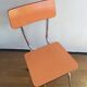 Orange formica chair