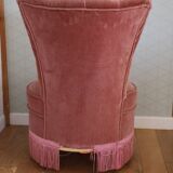 Powder pink fireside chair with fringes