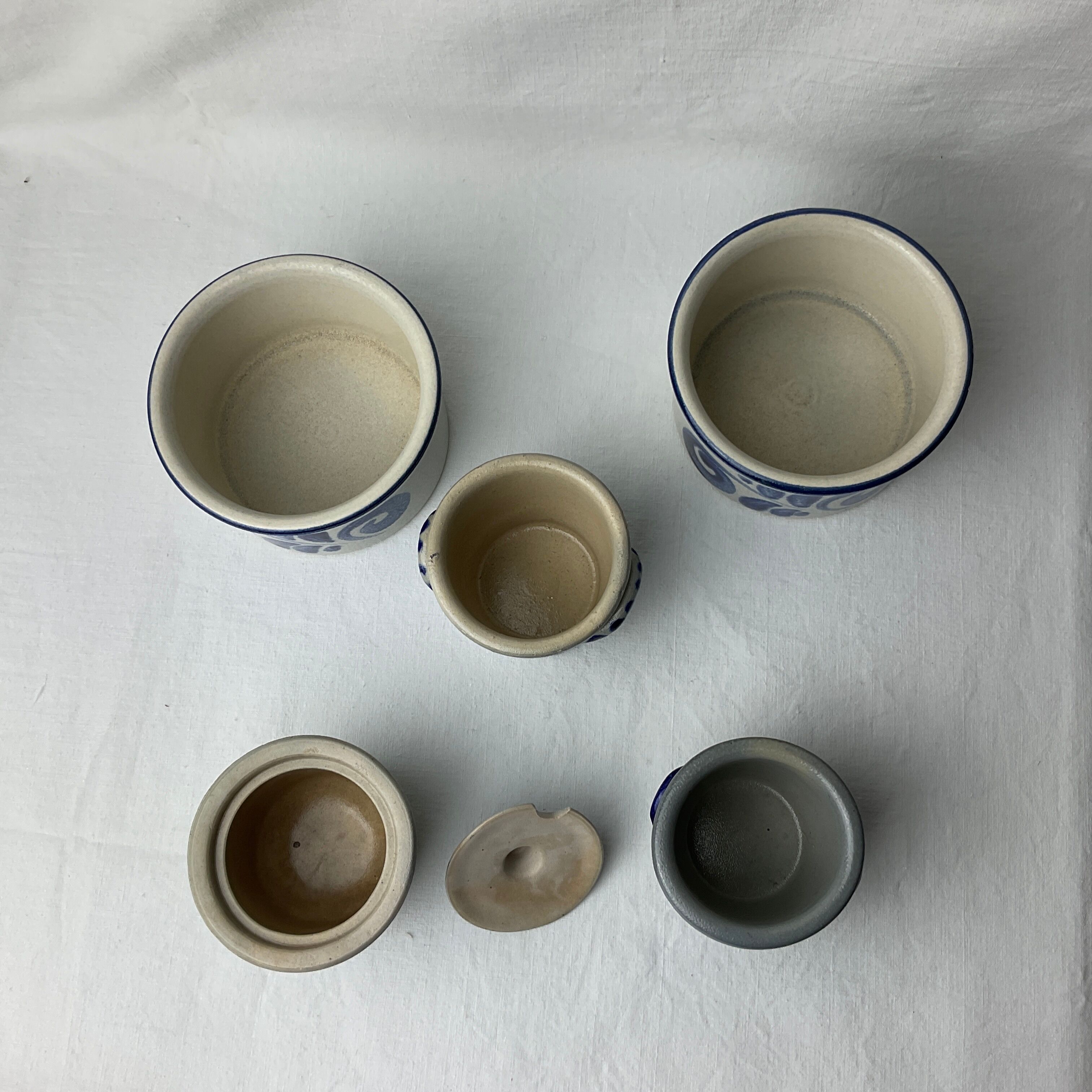 Series of 5 small blue sandstone pots