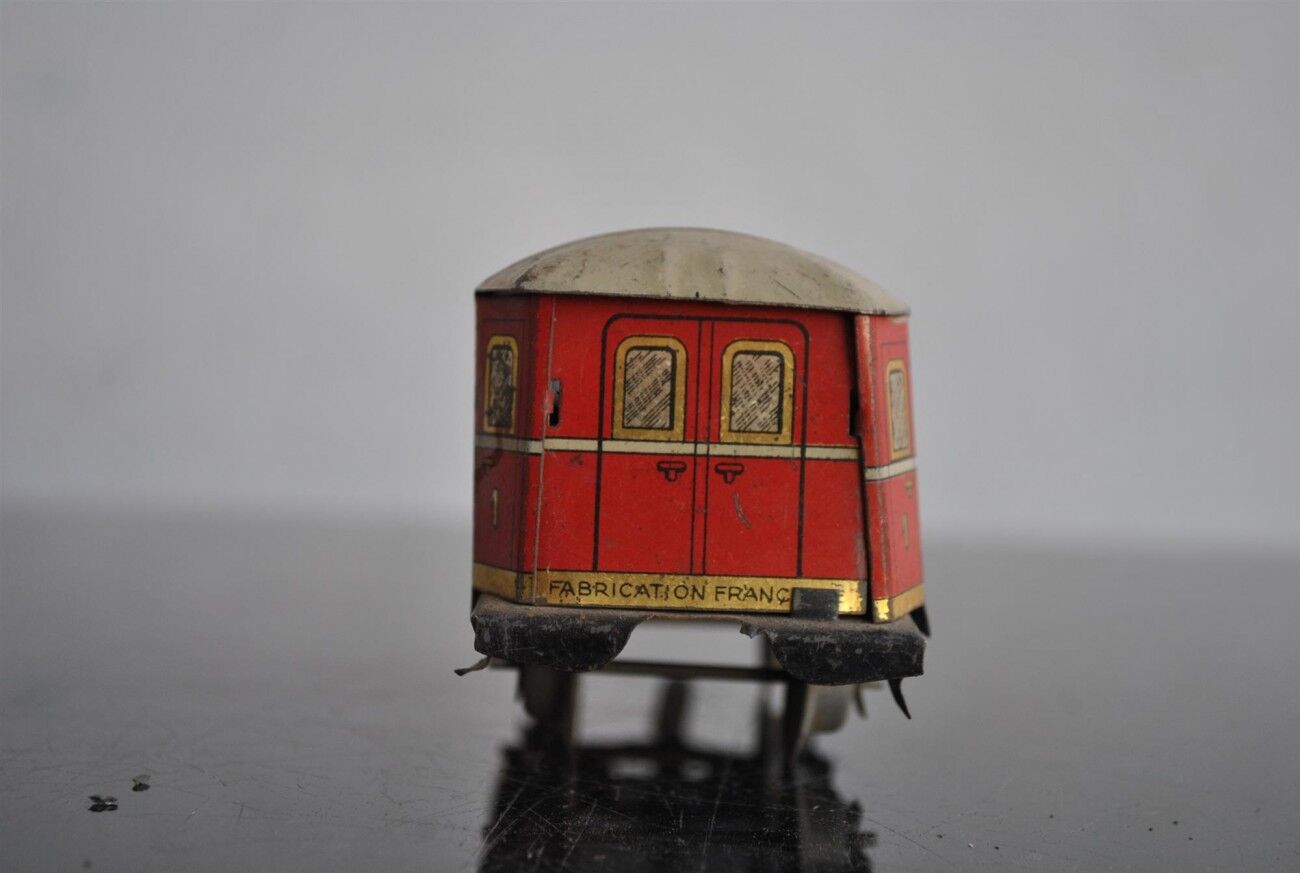 Tin litho brand LR spring-loaded toy locomotive