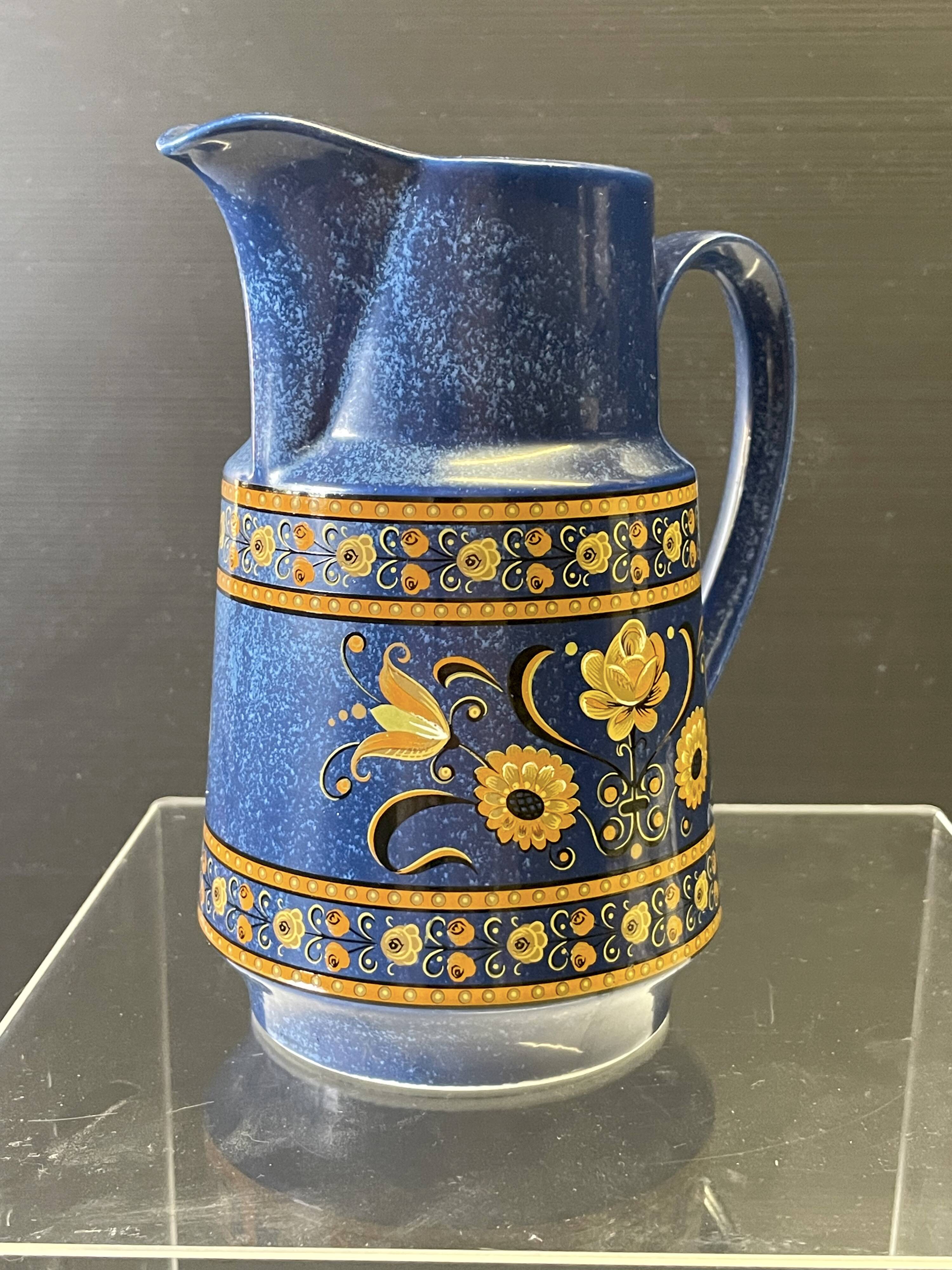 Very nice blue ceramic jug in good condition.