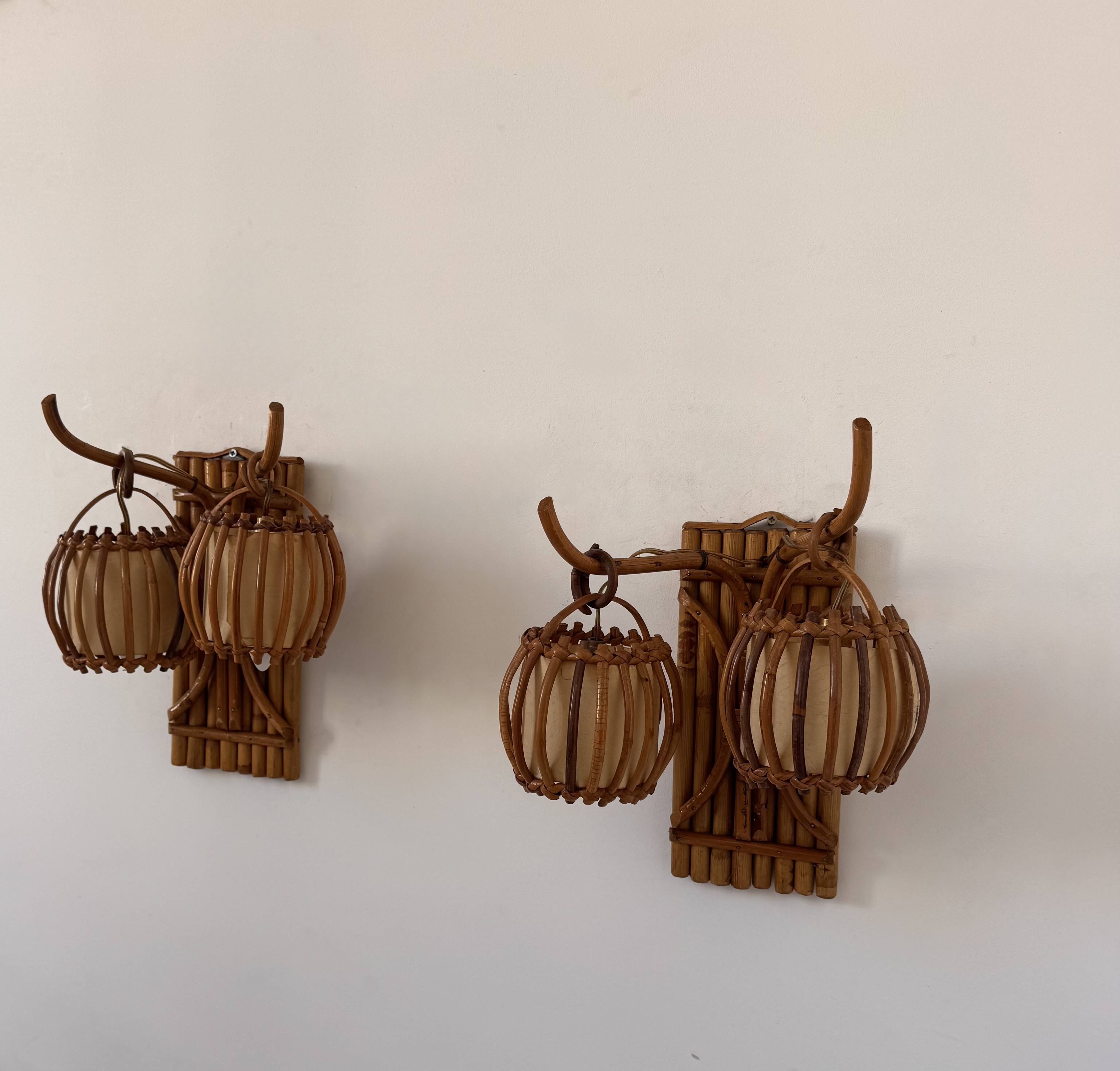 Vintage pair of rattan wall lights, France, 1950.