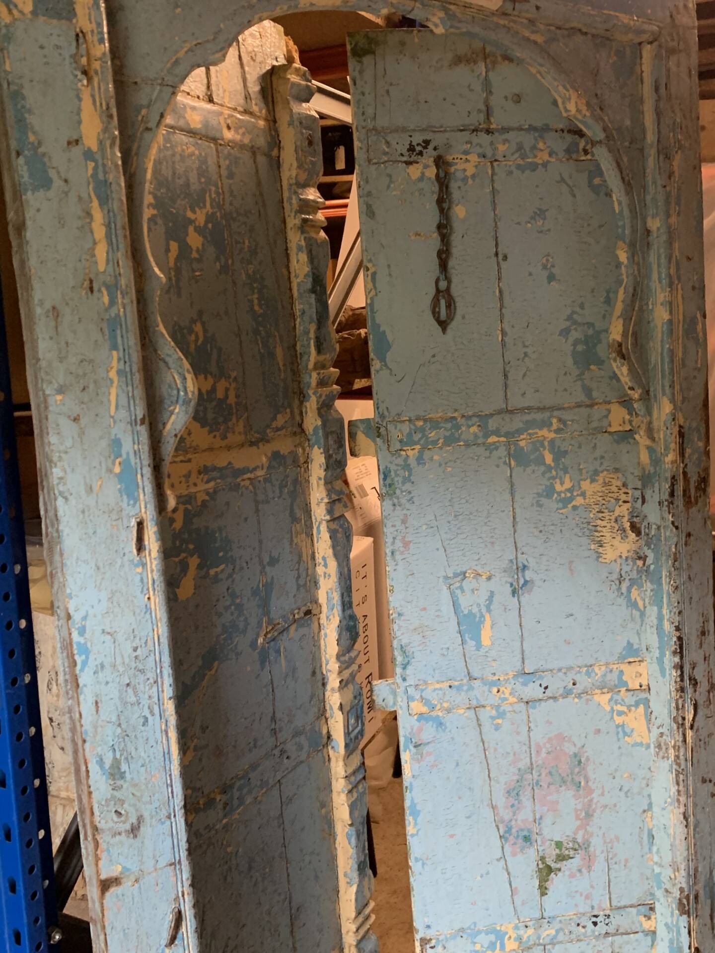 Blue patinated indian door with carved frame