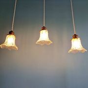 Art Deco trio of pendant lights/table lamps in clear glass, 1920s-30s.