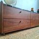 AMPM Noham TV unit, walnut sideboard with amber marble.
