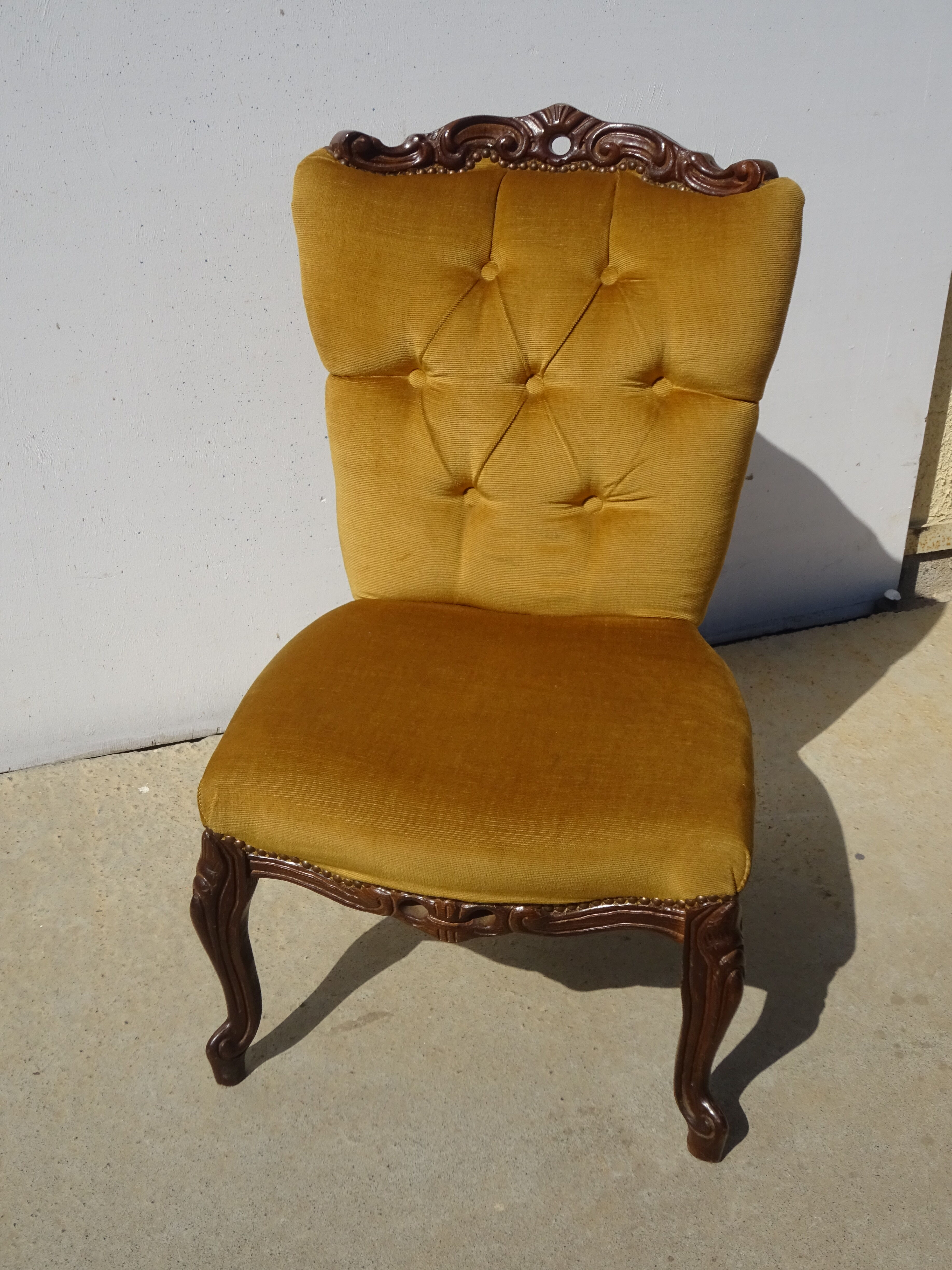 Golden yellow velvet armchairs