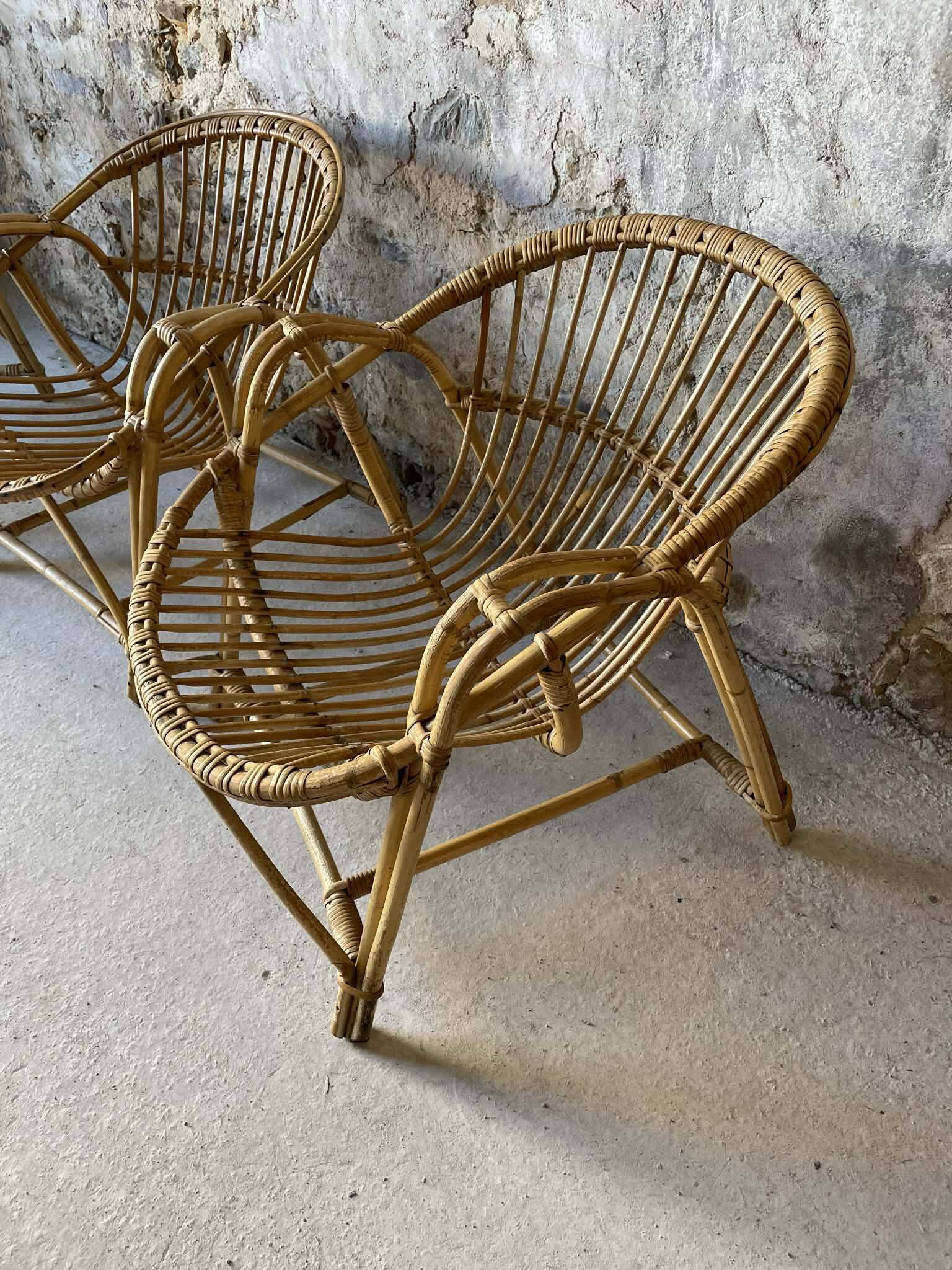 Vintage wicker armchair from the 1970s.