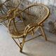 Vintage wicker armchair from the 1970s.