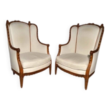 Pair of neoclassical style bergère armchairs