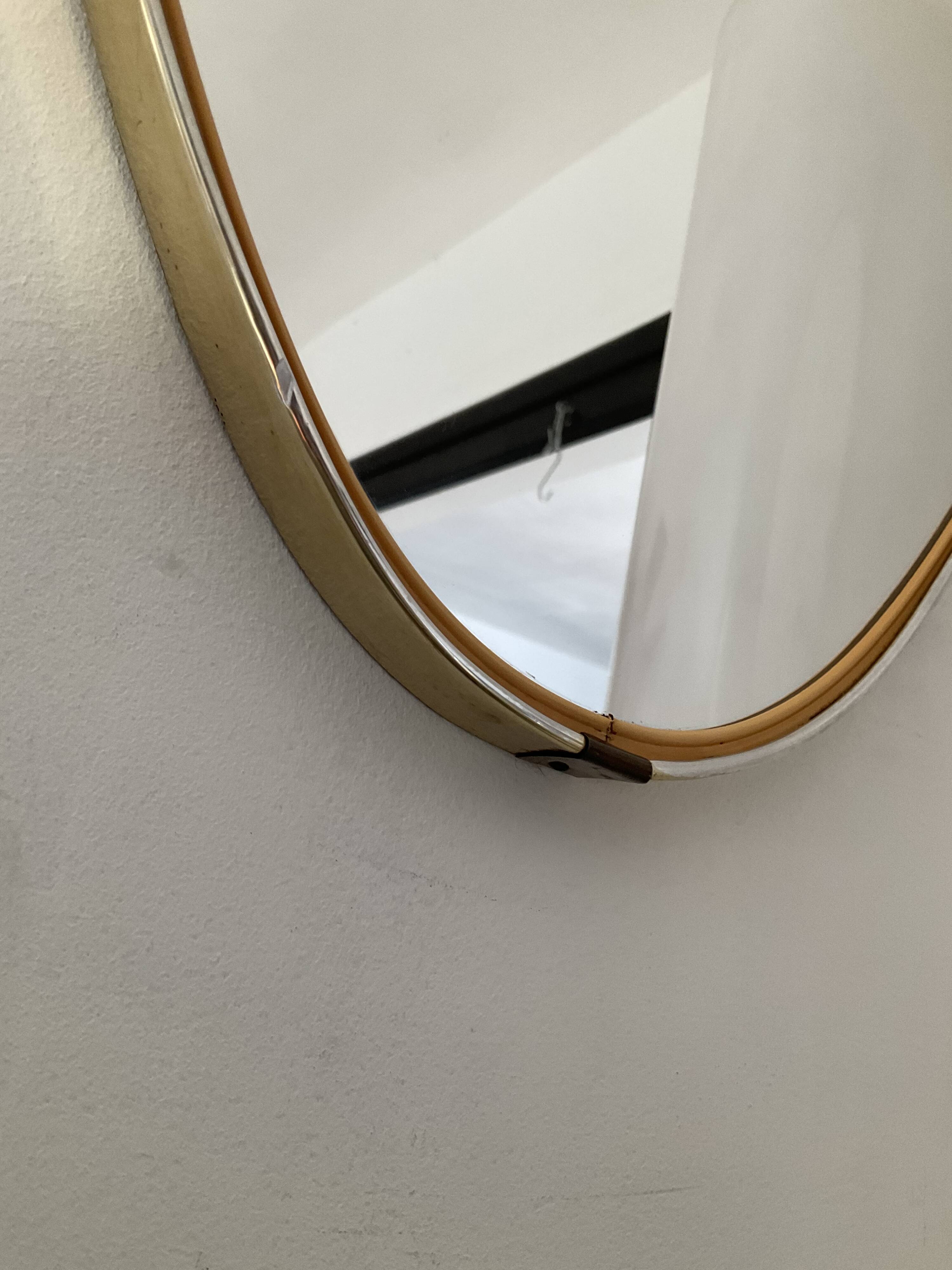 Asymmetrical free-form mirror from the 60s and 70s